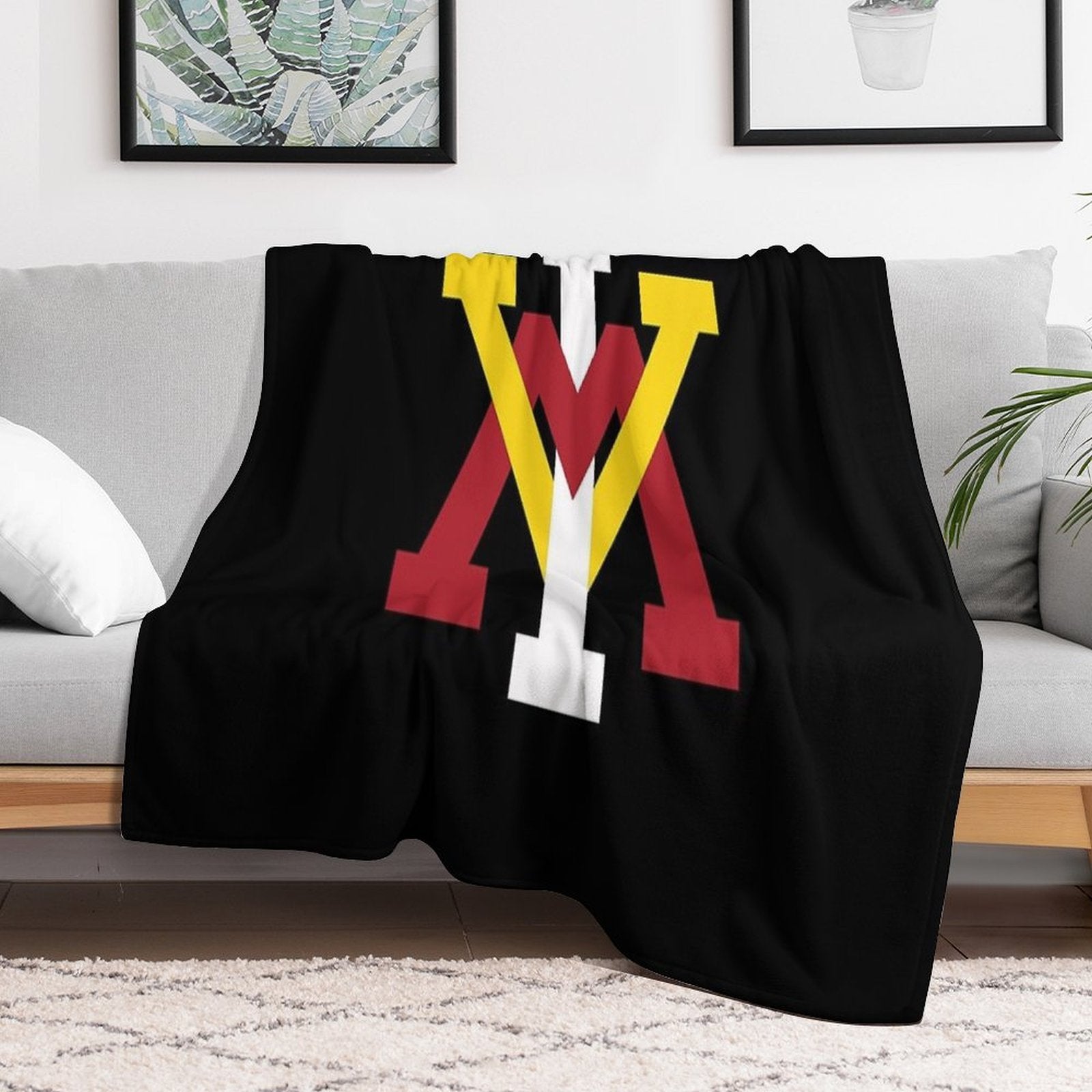 The VMI Iconic Travel-friendly Throw Blanket
