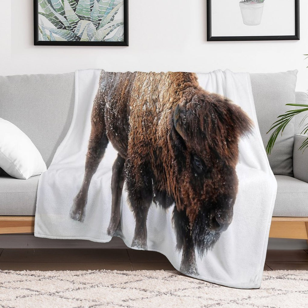 An American Bison Moves Through A Winter Snowstorm Versatility Throw Blanket