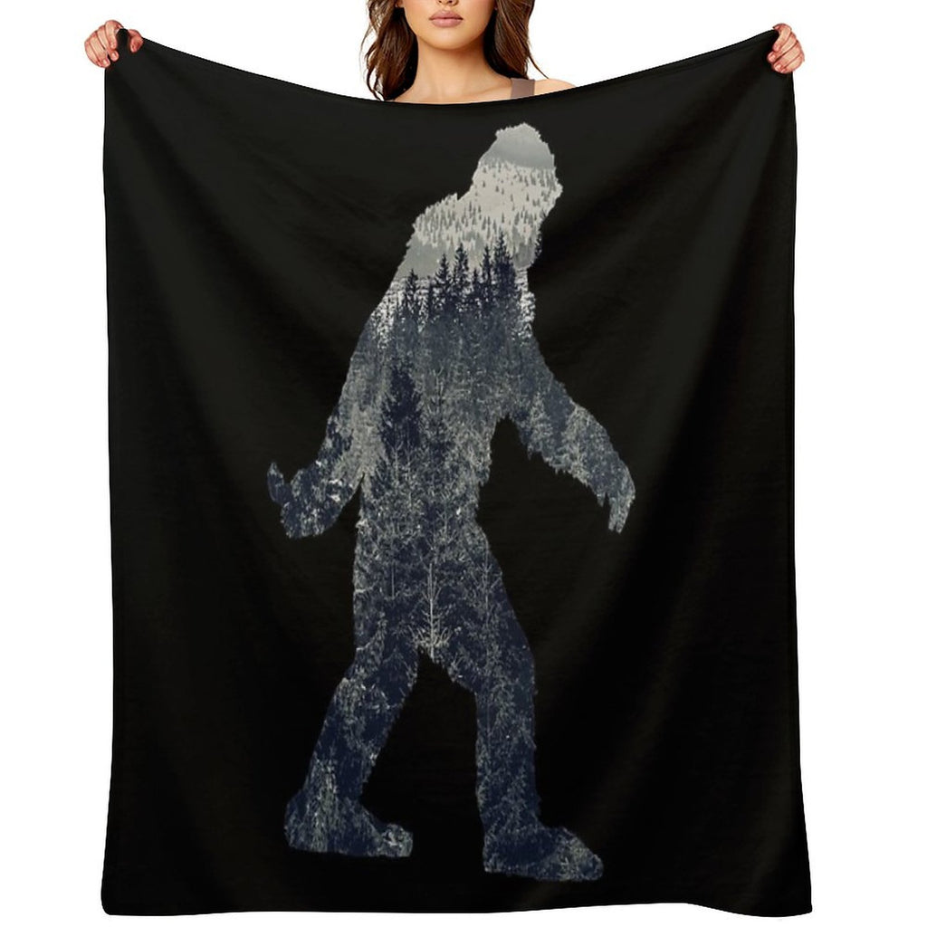 A Sasquatch Silhouette in The North Velvety-soft Throw Blanket