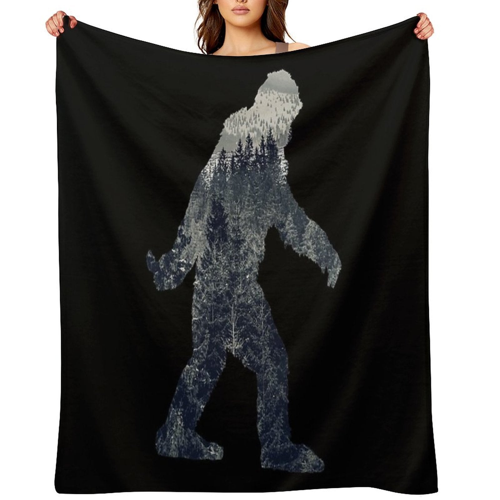 A Sasquatch Silhouette in The North Velvety-soft Throw Blanket
