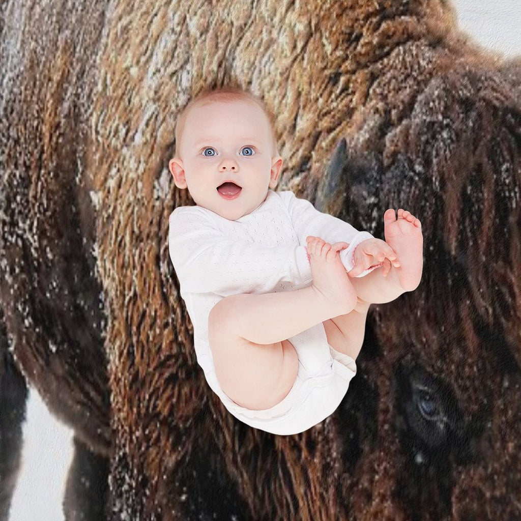 An American Bison Moves Through A Winter Snowstorm Versatility Throw Blanket