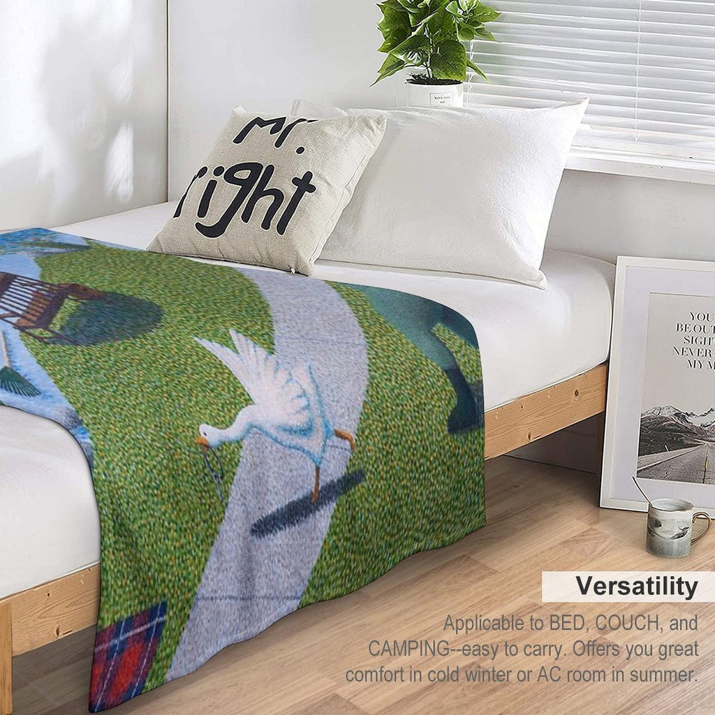 Une Oie Compact Throw Blanket