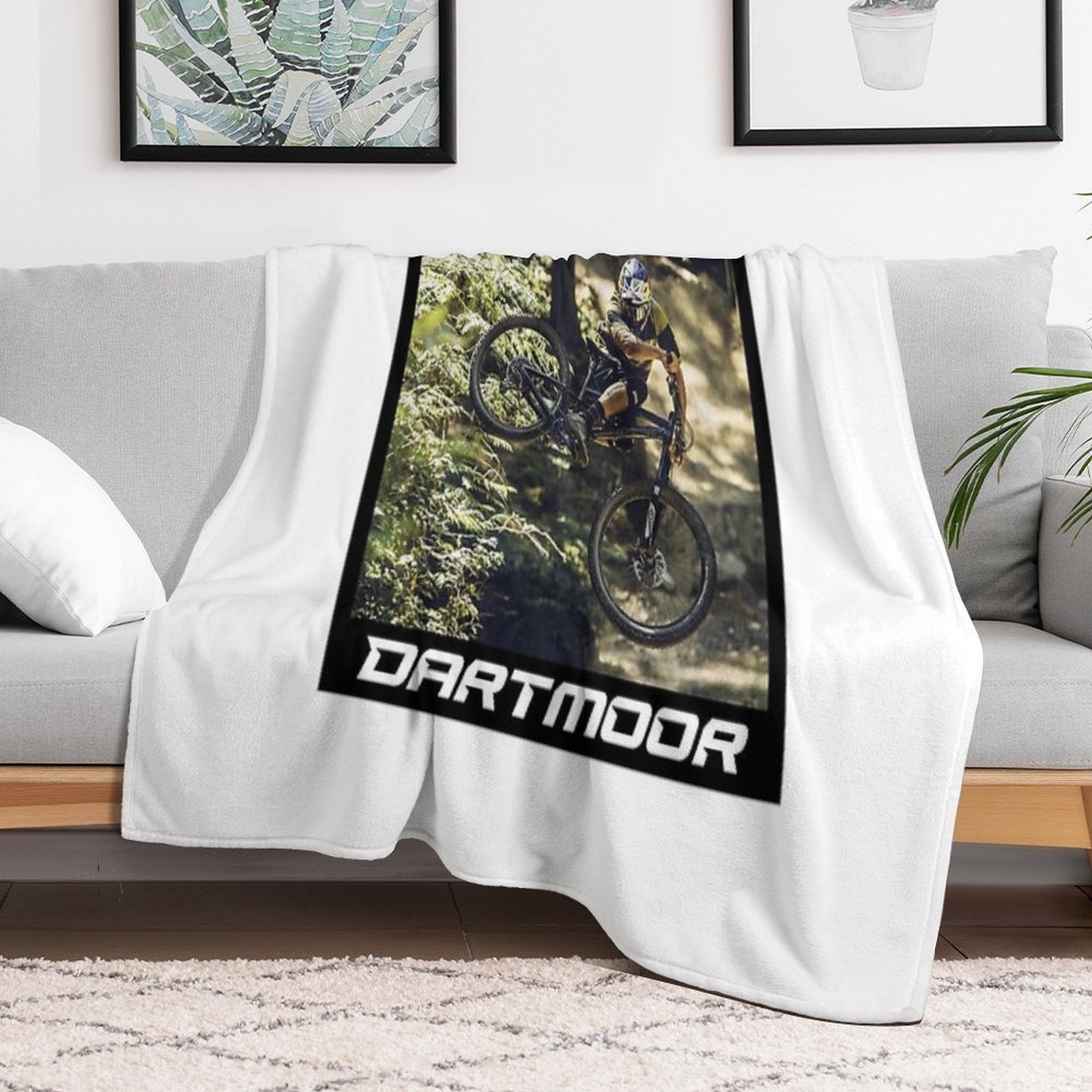 Cyclist Jumping with His Dartmoor Bikes Travel-friendly Throw Blanket