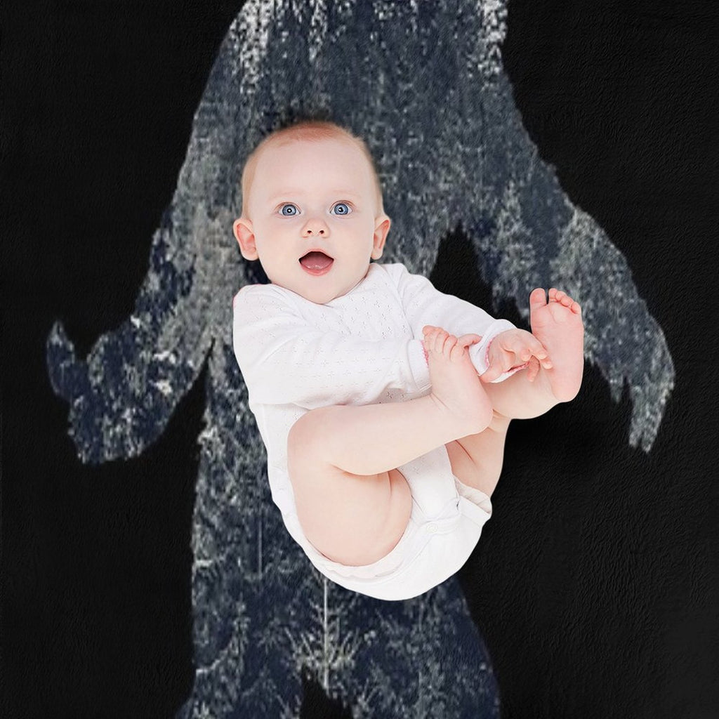 A Sasquatch Silhouette in The North Velvety-soft Throw Blanket