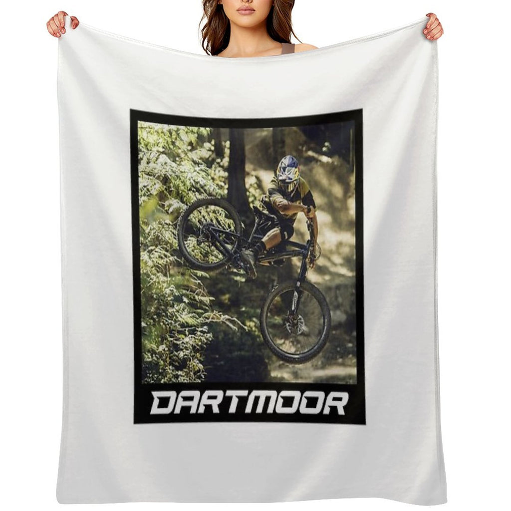 Cyclist Jumping with His Dartmoor Bikes Travel-friendly Throw Blanket